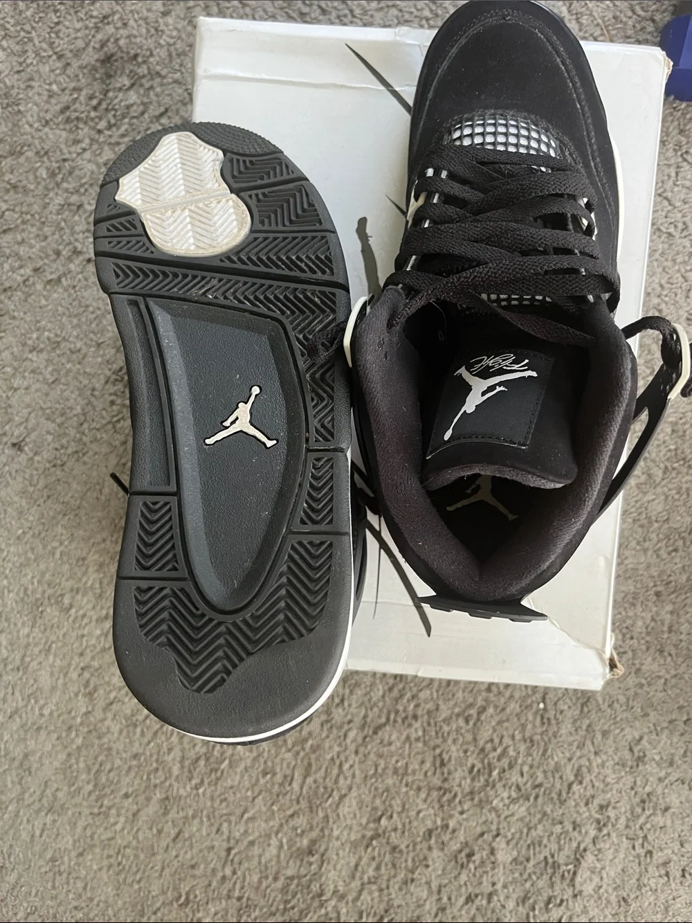 AIR JORDAN 4 RETRO Men’s Black and White Sneaker